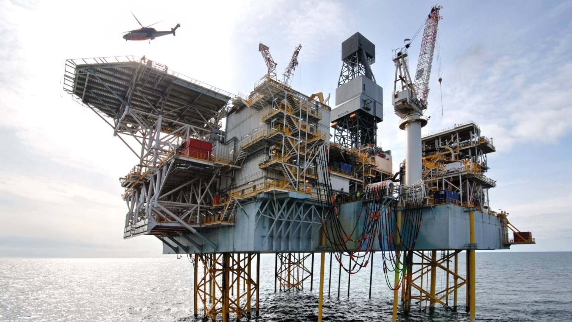 Photo of BP’s Shakh Deniz Alpha Platform with helicopter taking off from helipad