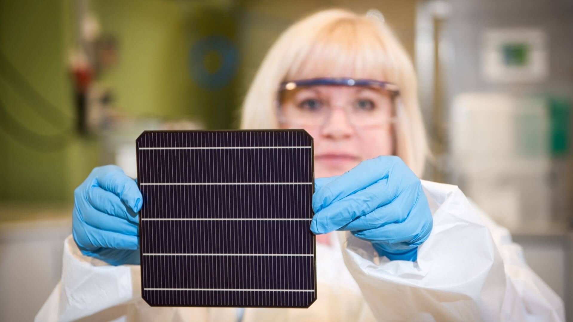 Engineer holding up solar PV