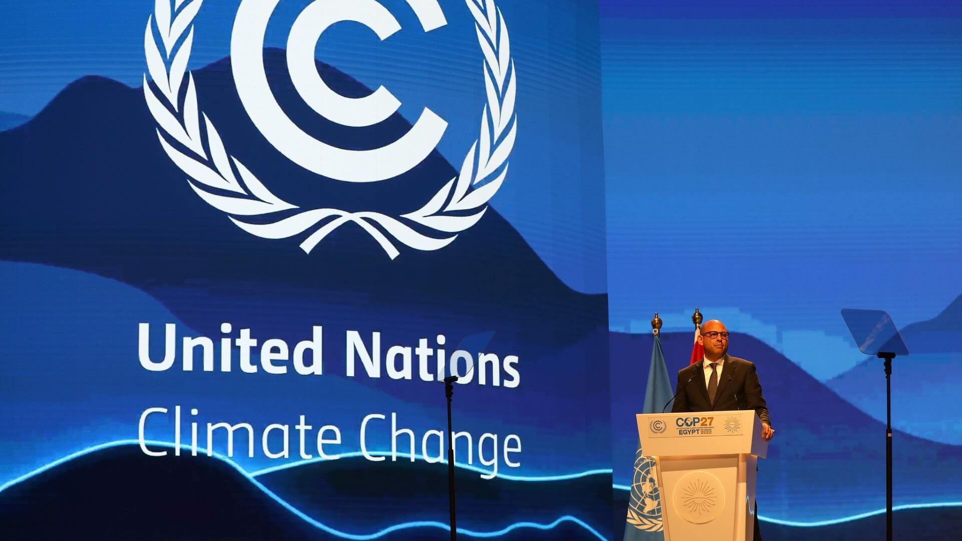 UN Climate Change Executive Secretary Simon Stiell standing at podium and speaking at the closing plenary session of COP27