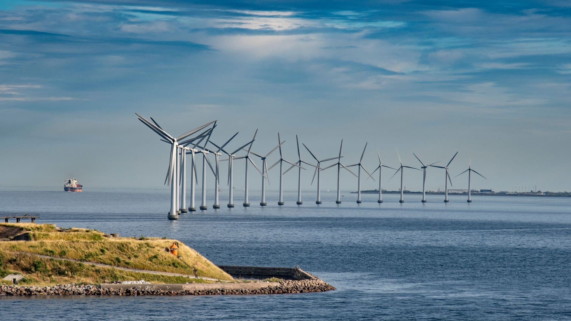 Row of wind turbines offshore of Danish coast