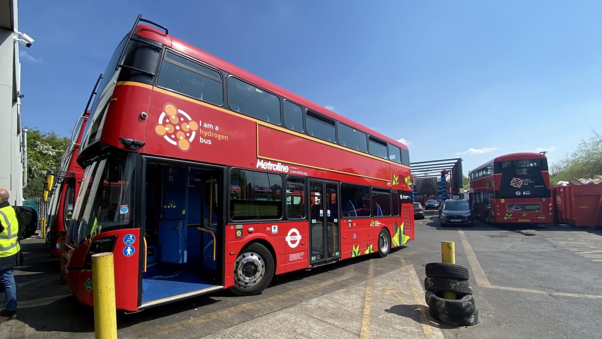 Close up of red, hydrogen powered double decker bus in parking bay