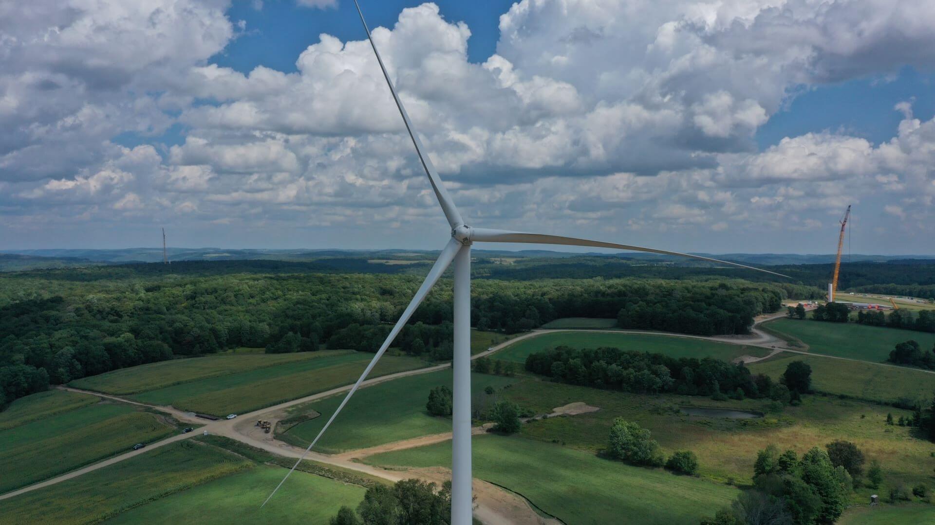 Close up of wind turbine in green field, New York State