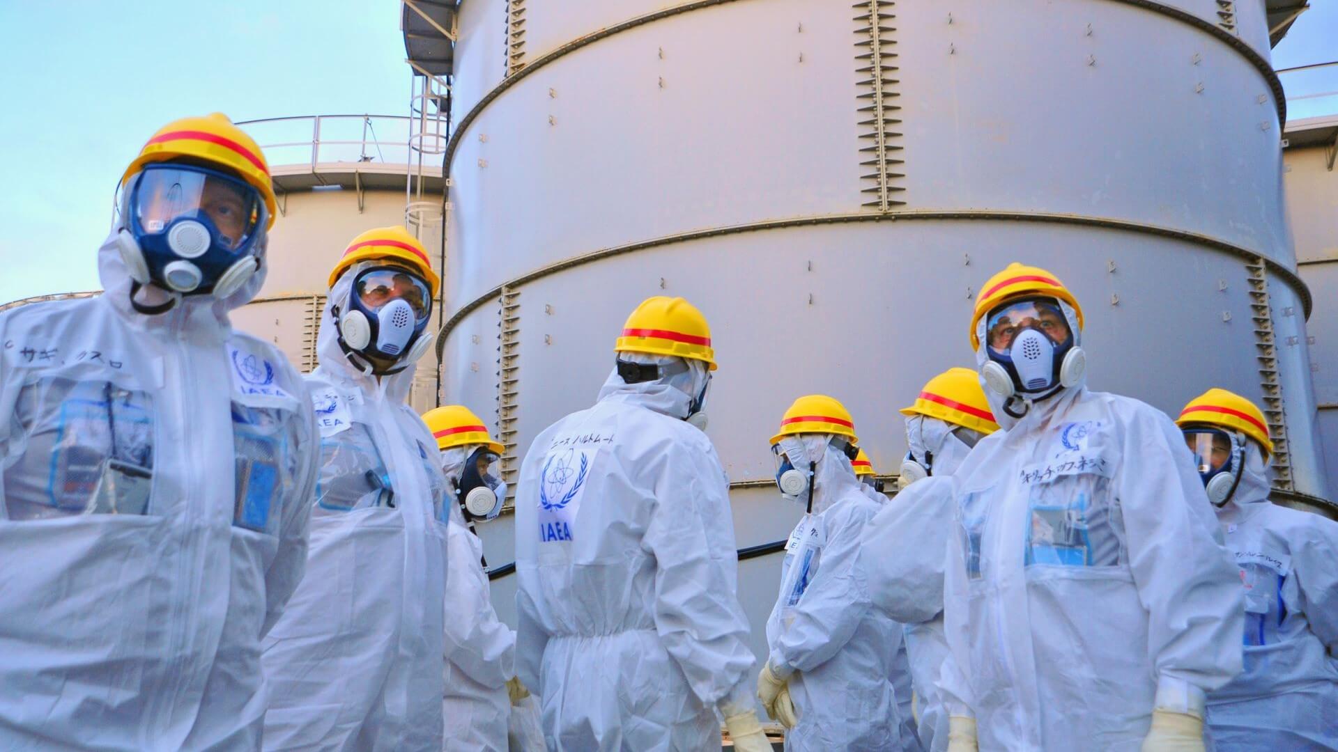 Group of workers wearing nuclear PPE