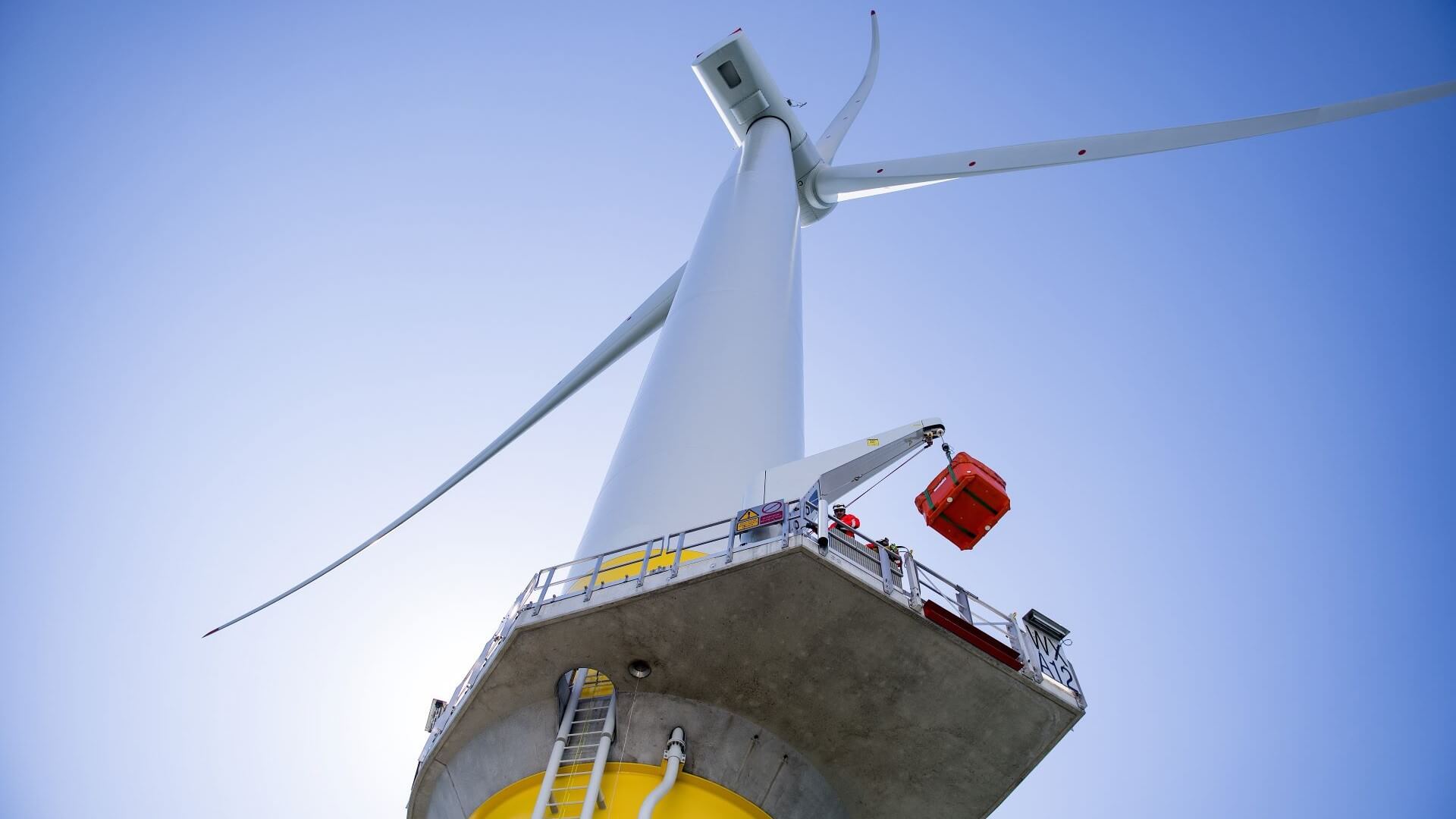 View from below looking up at offshore wind turbine
