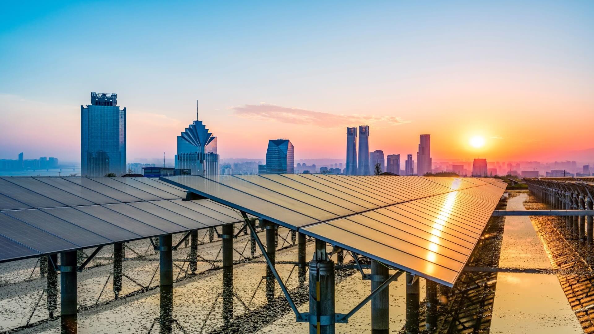 Rooftop solar panels with Shanghai skyline in the background