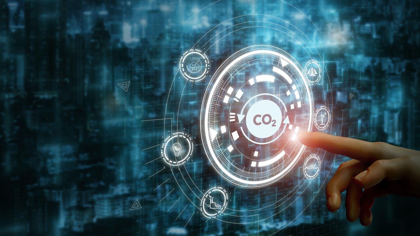 Graphic of a hand touching a dial with a CO2 sign