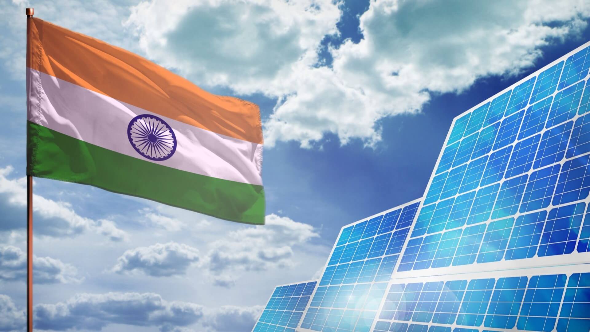 Indian flag flying near solar panels