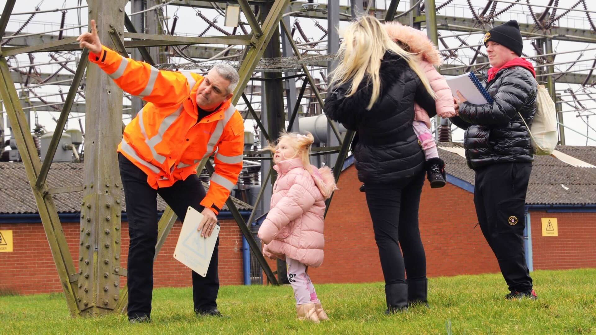 Lucy and family on tour with National Grid officials 