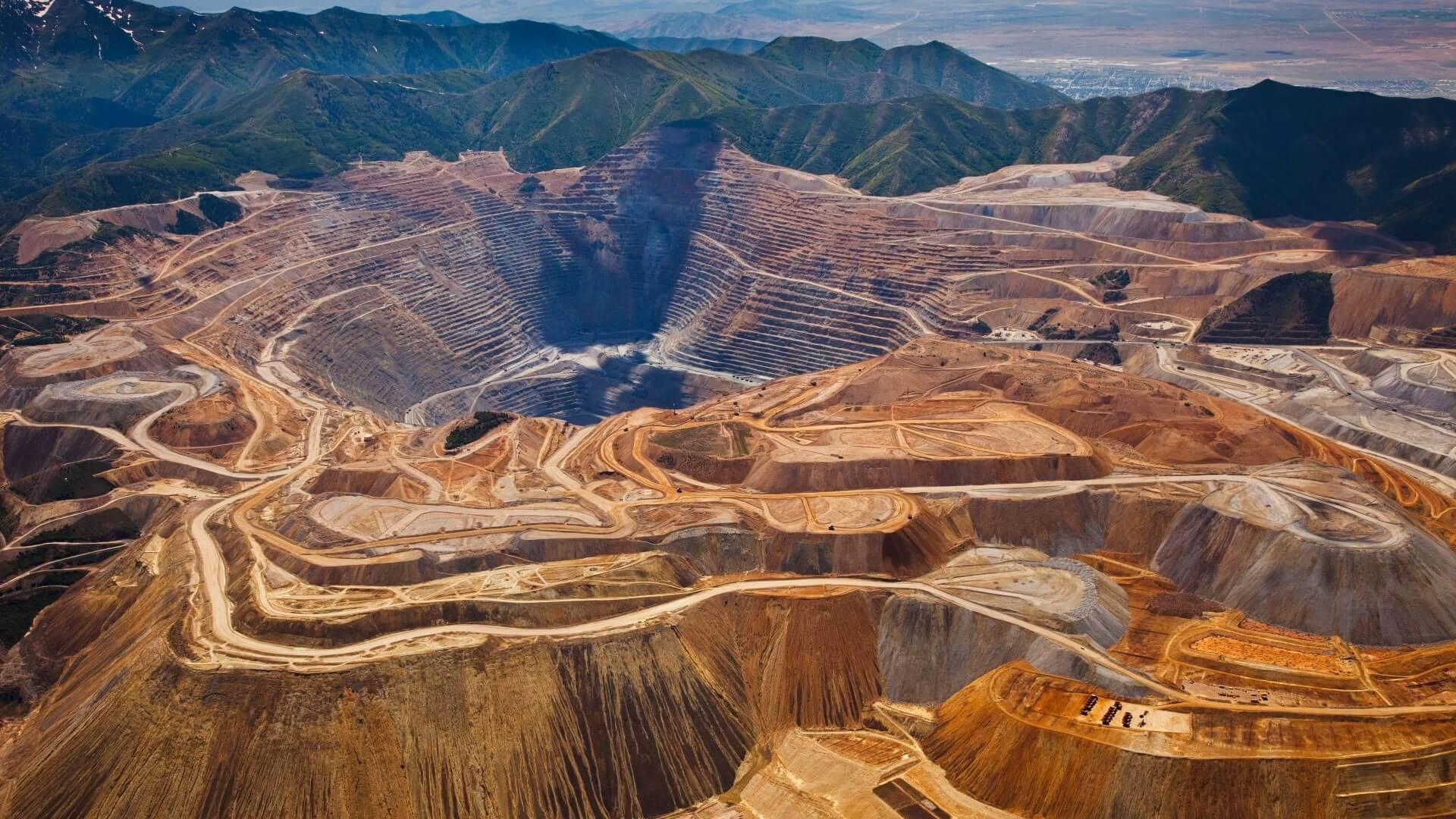 Aerial view over open mining pit, showing different terraced levels