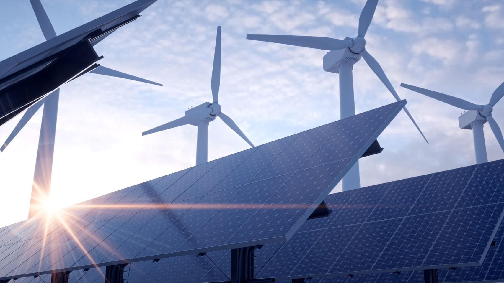 Solar panels and wind turbines against a blue sky