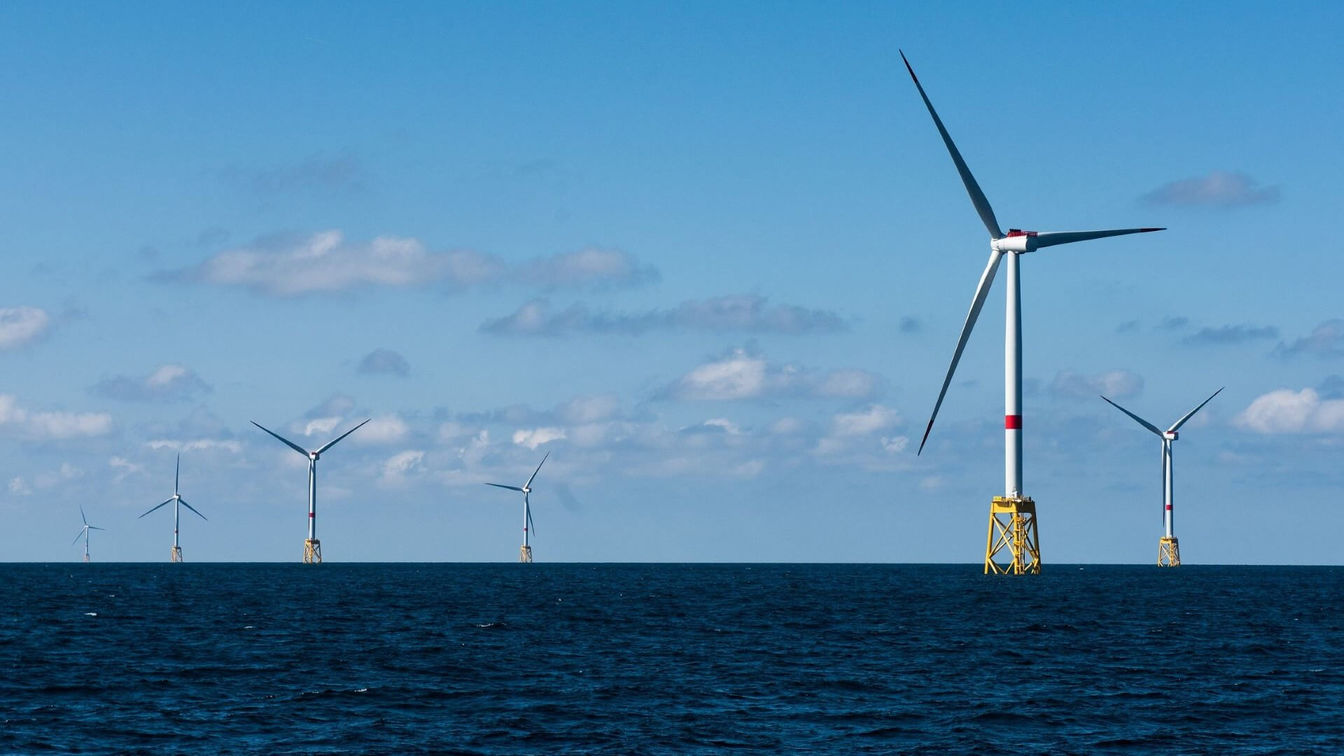 View of Saint-Brieuc wind farm with calm sea and blue sky