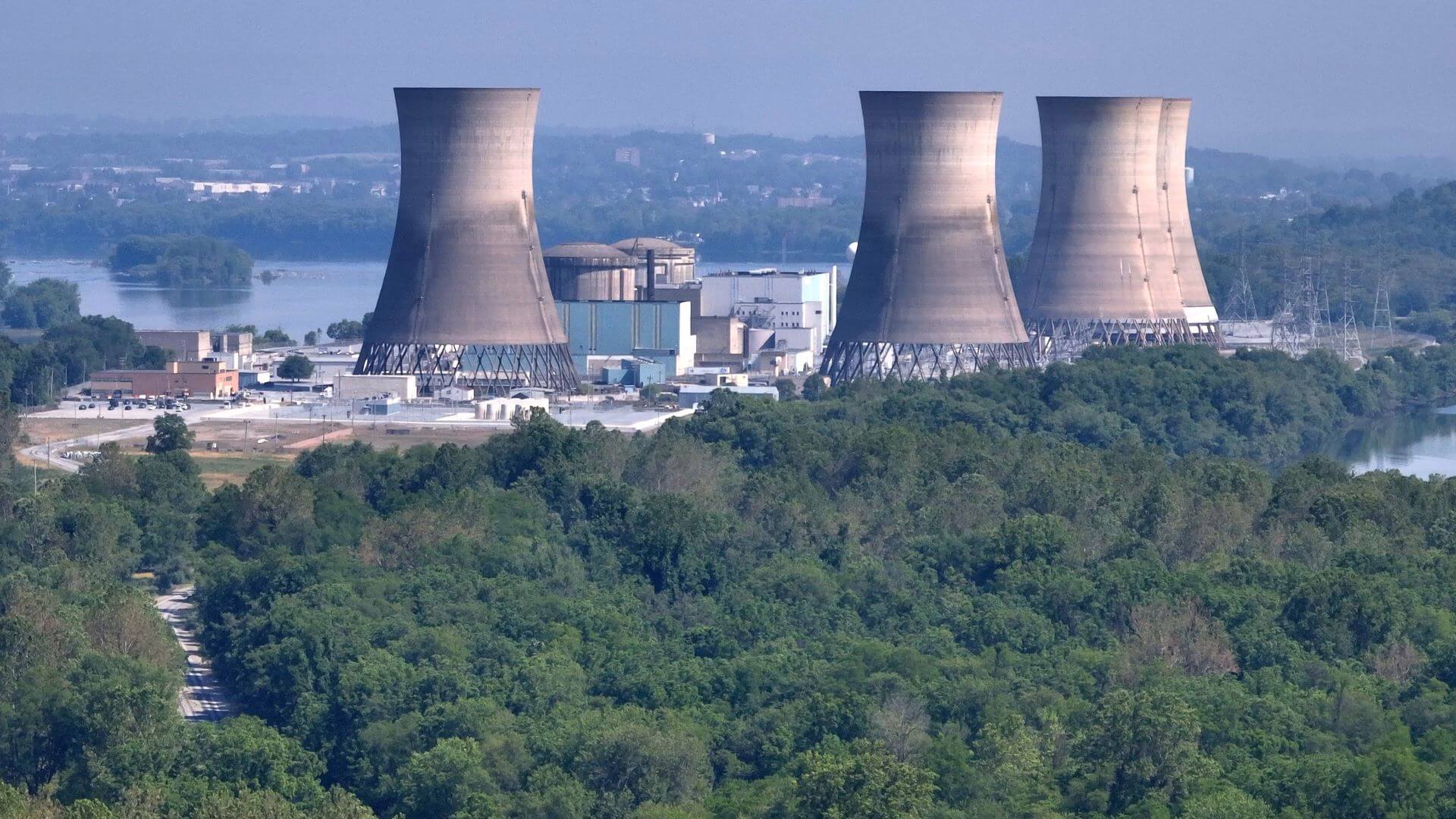 Exterior shot of Three Mile Island nuclear plant and surrounding trees