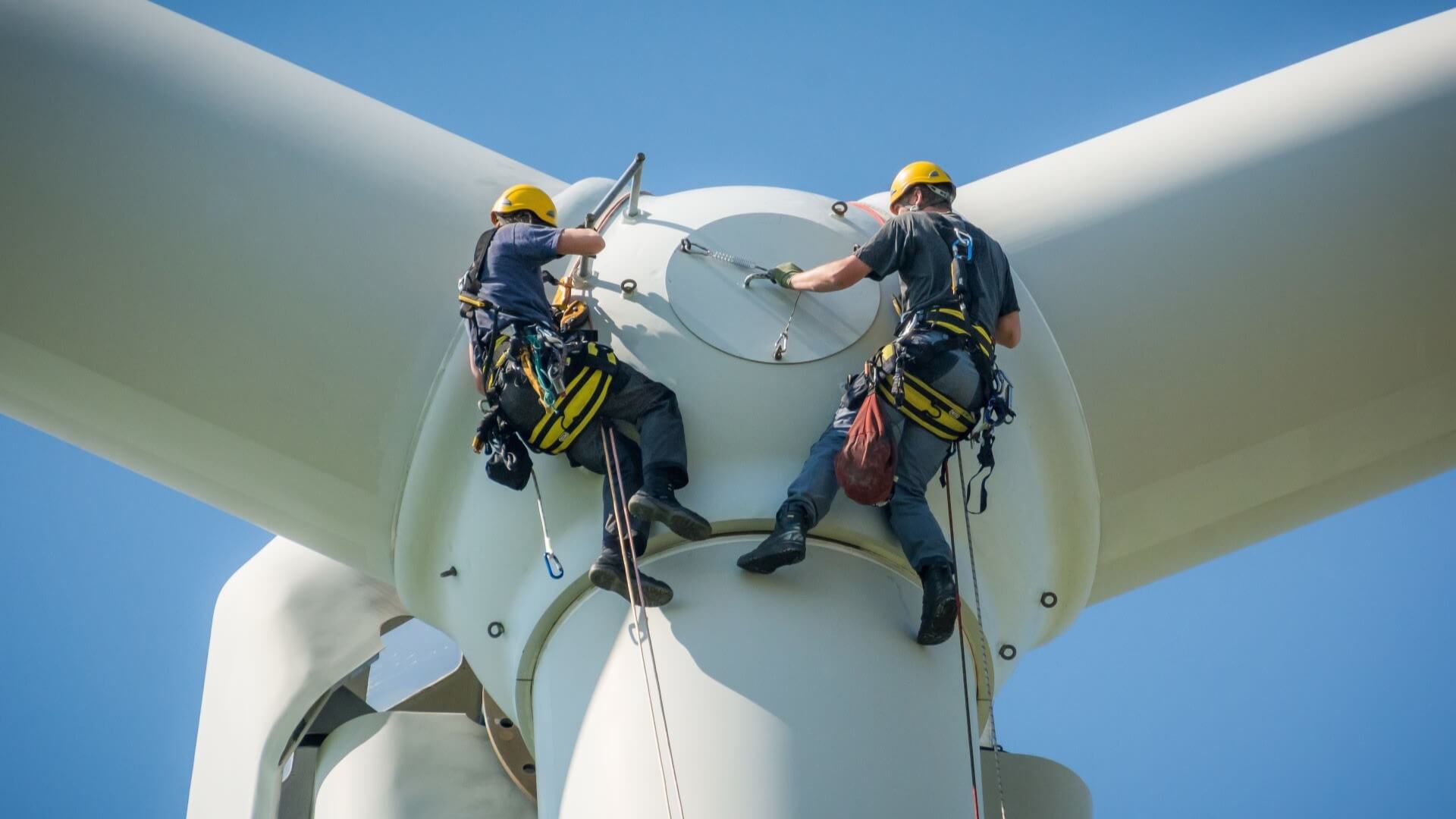 Two engineers working on wind turbine