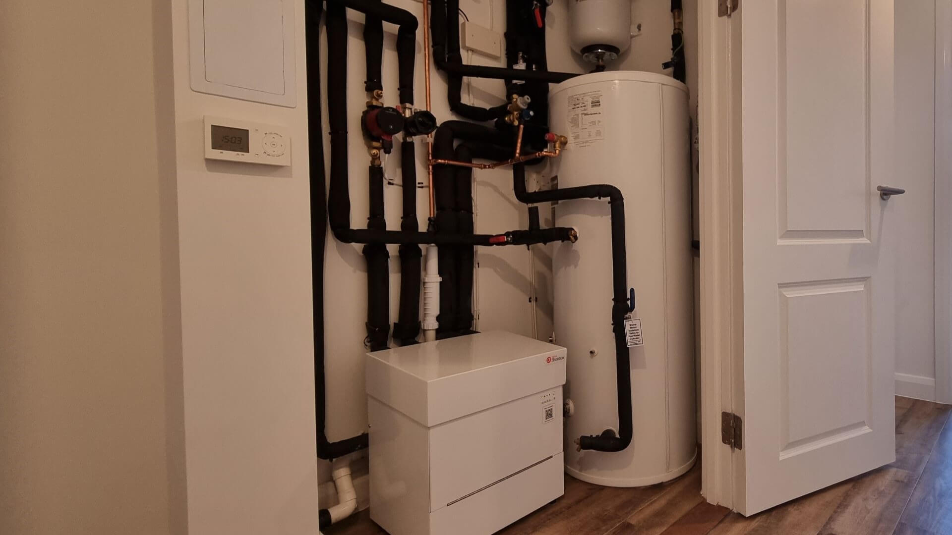 Heat pumps installed inside building