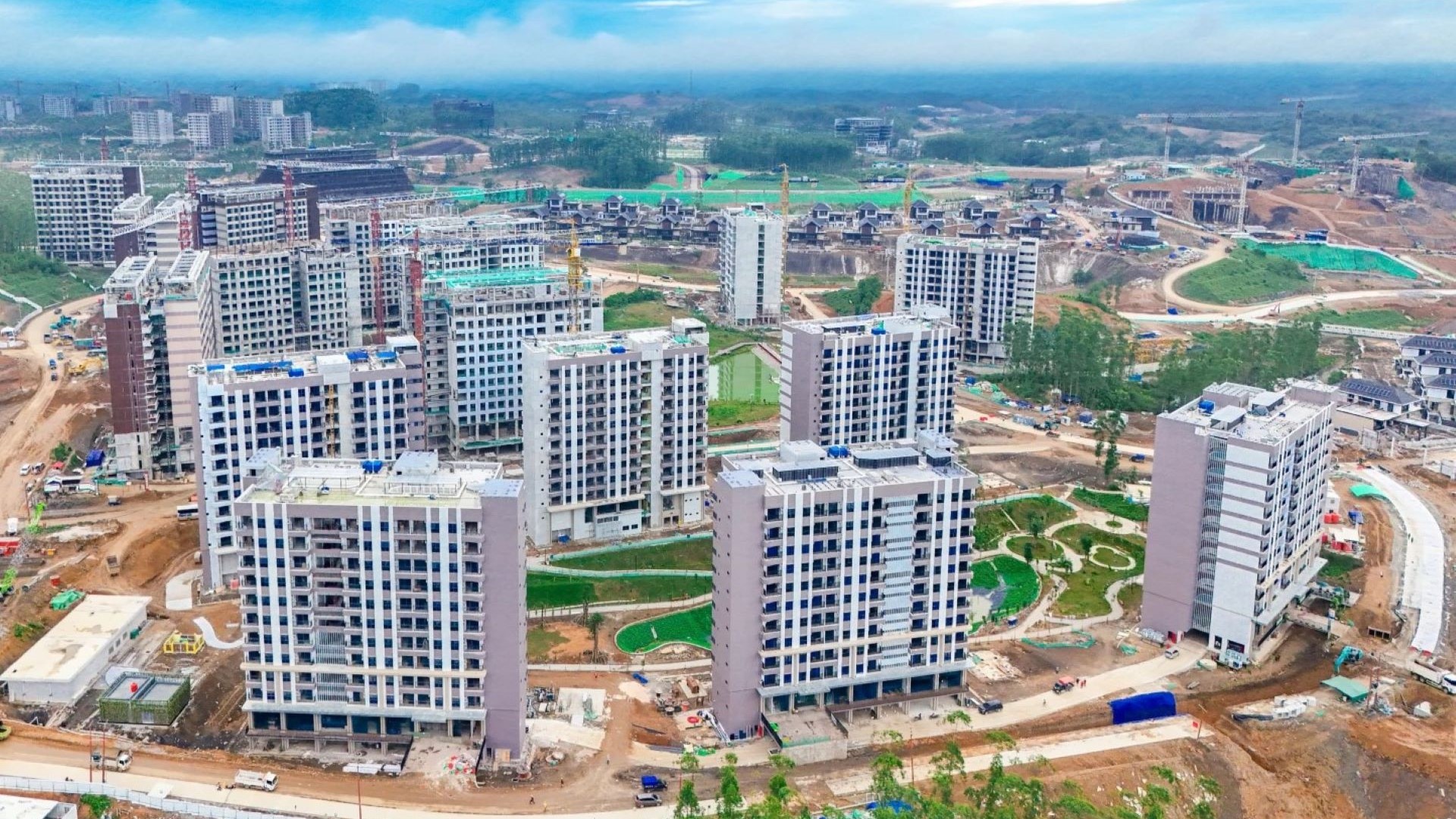 Ten-plus high-rise residential blocks and road infrastructure under construction